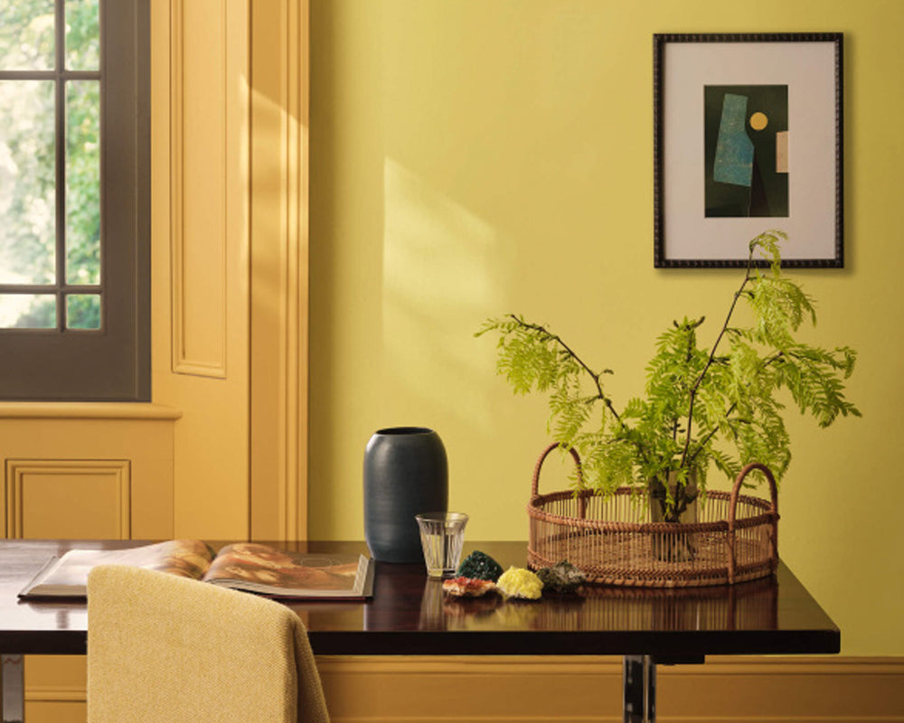 Paint & Paper Library Peruvian Yellow 710 Paint in an office set up with modern furnishing
