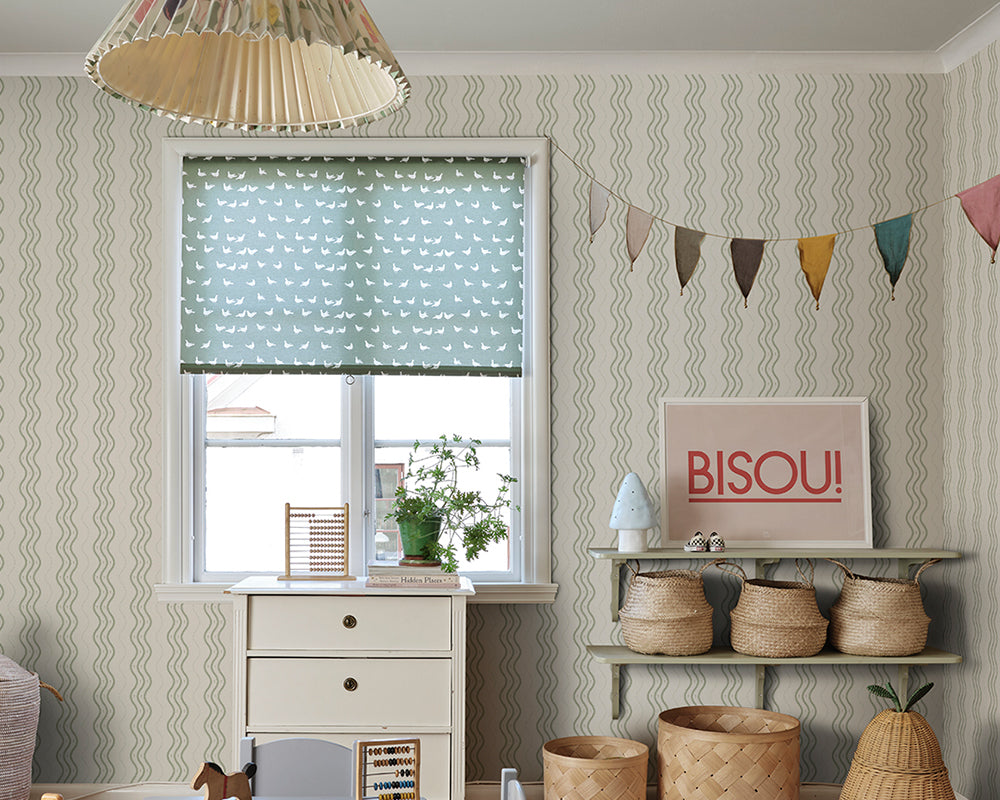 Sandberg Ben Wallpaper in Garden Green in a bedroom