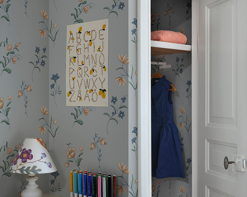 Sandberg Hanna Wallpaper in Misty Blue in a kid bedroom