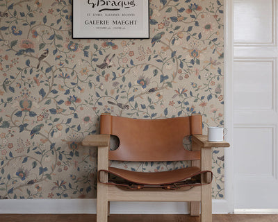Sandberg Hedda Wallpaper in Sandstone with a chair