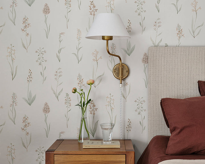 Sandberg Alma Wallpaper in Blush in a bedroom