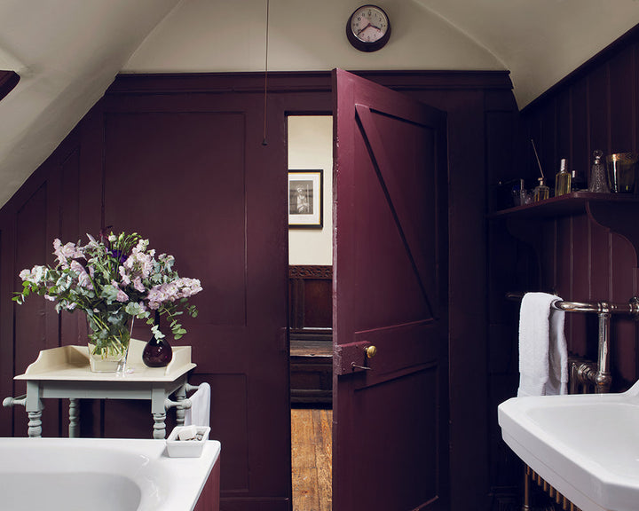 Brinjal 222 paint by Farrow & Ball on the walls of a traditional bathroom