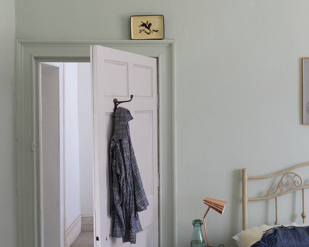 Cromarty 285 paint by Farrow & Ball on a bedroom wall