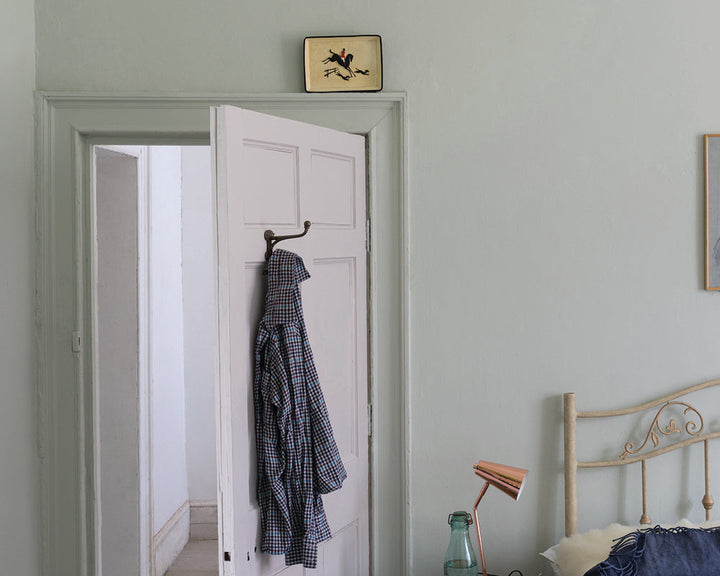 Cromarty 285 paint by Farrow & Ball on a bedroom wall