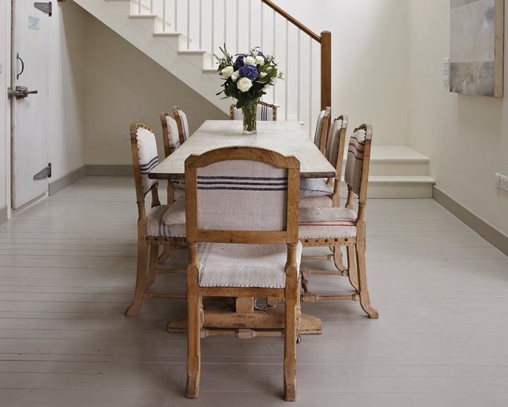 Hardwick White 5 paint by Farrow & Ball on a dining room wooden floor