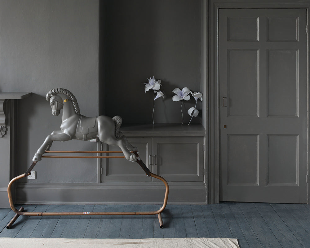 Mole's Breath 276 paint by Farrow & Ball in a nursey on the walls and woodwork