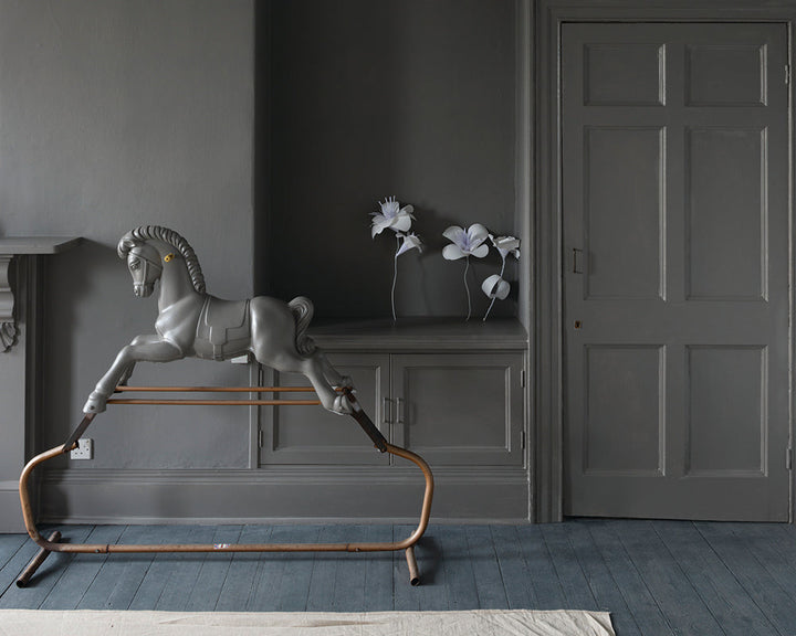 Mole's Breath 276 paint by Farrow & Ball in a nursey on the walls and woodwork