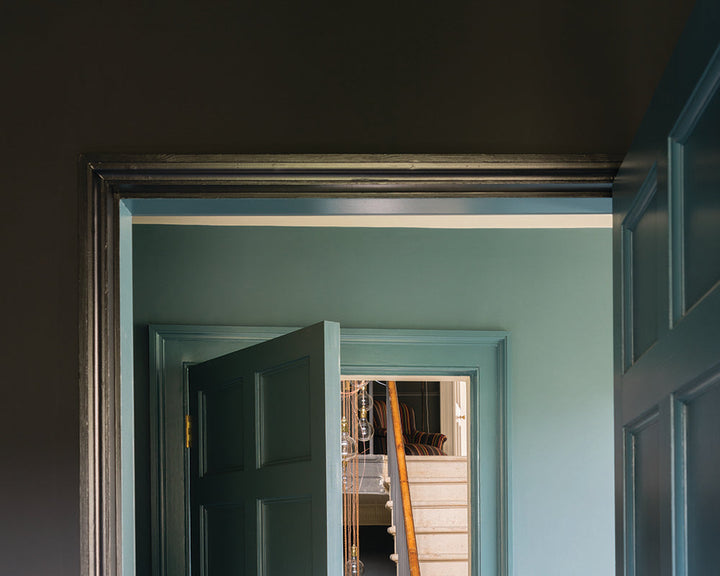 Tanner's Brown 255 paint by Farrow & Ball on the walls with contrasting woodwork