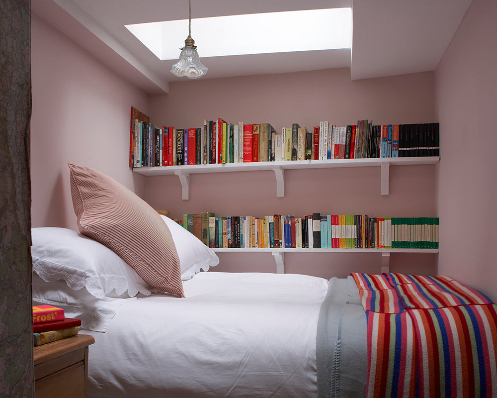 Calamine 230 paint by Farrow & Ball on the walls of a small bedroom