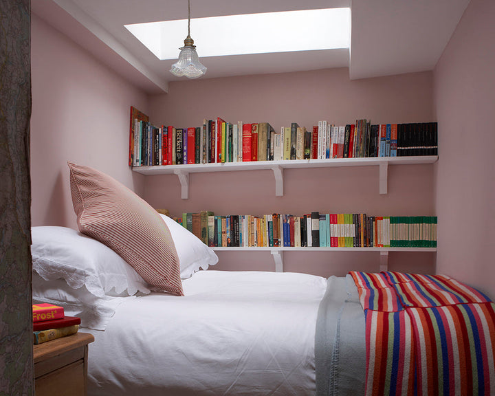 Calamine 230 paint by Farrow & Ball on the walls of a small bedroom
