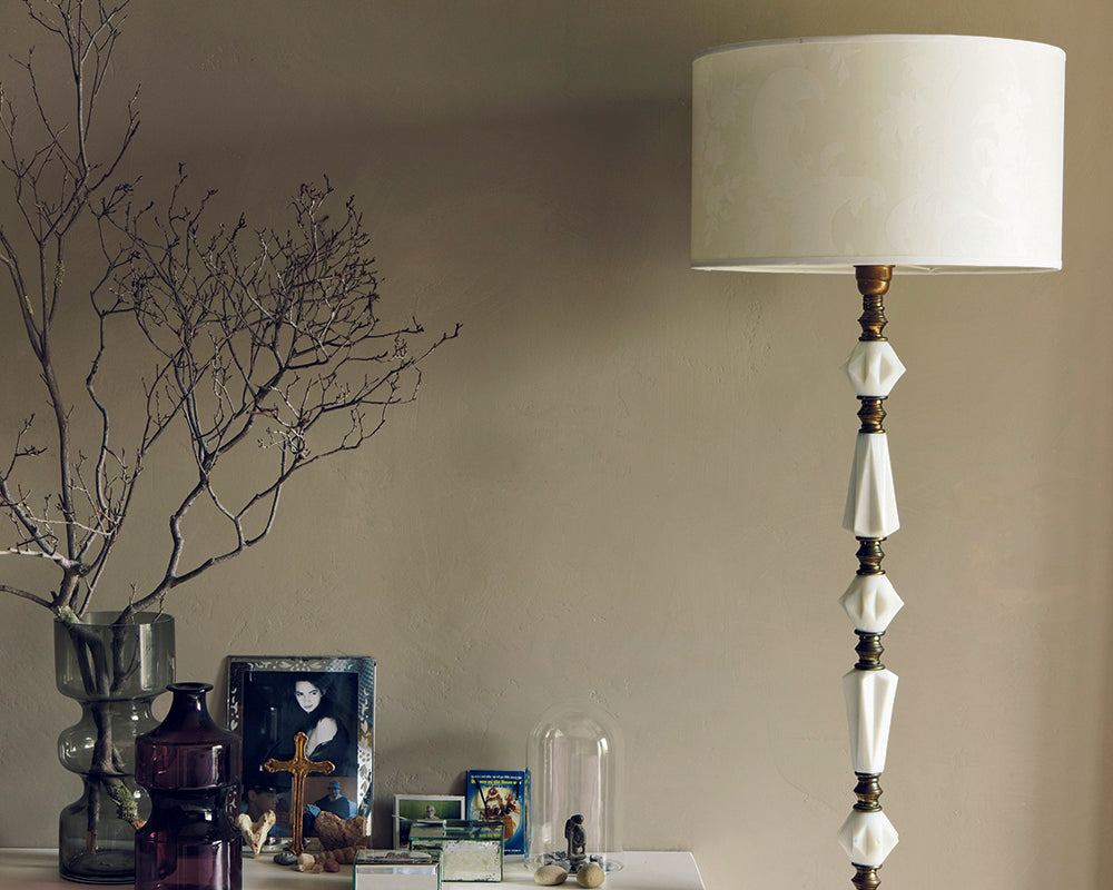 Light Gray 17 paint by Farrow & Ball in a room with a lamp and decor