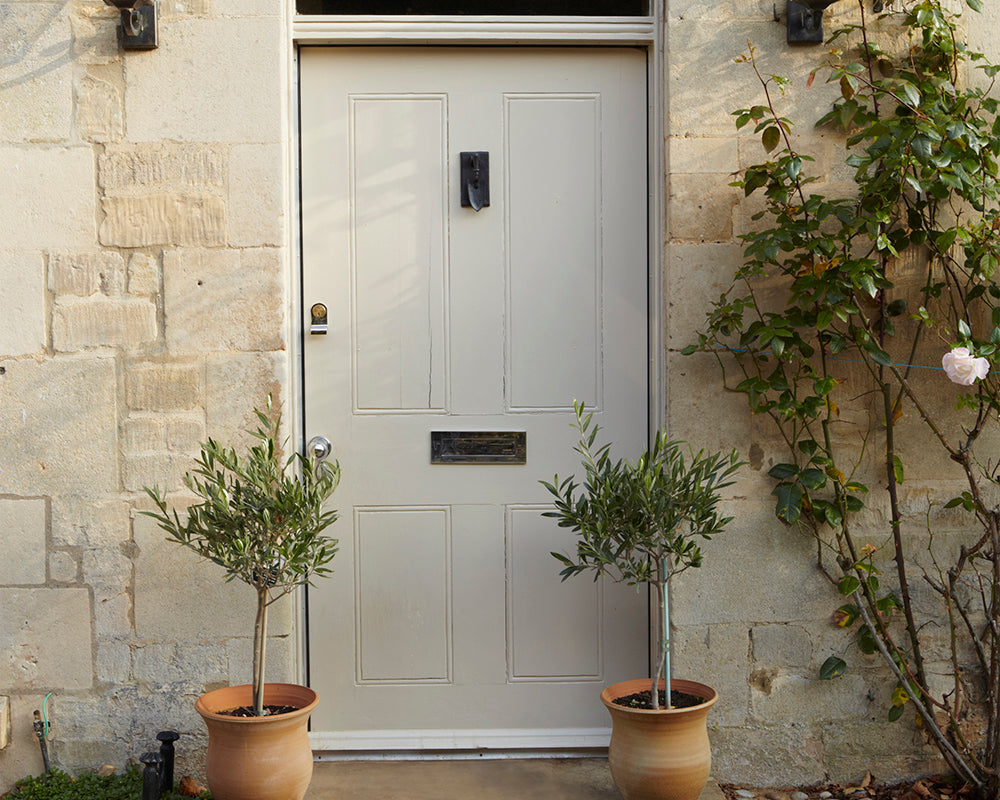 Stony Ground 211 paint by Farrow & Ball on a traditional style front door