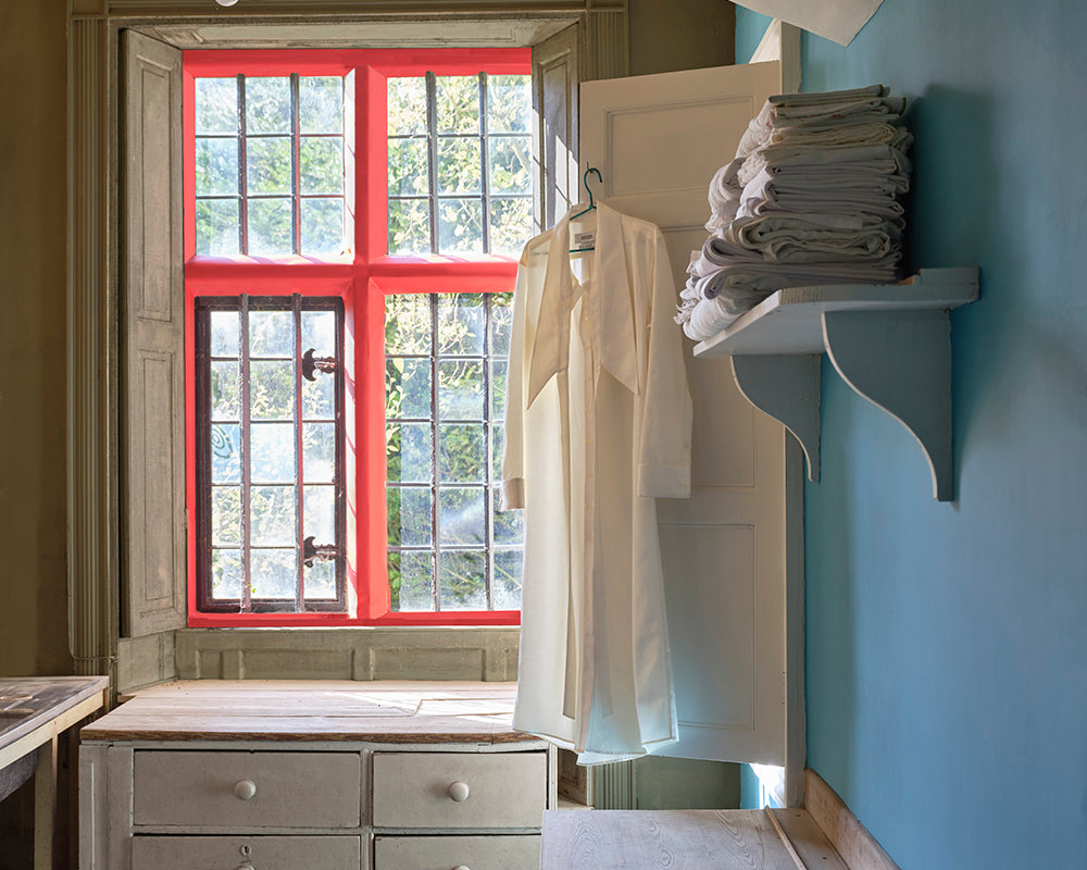Lobster CB7 paint by Farrow & Ball on the walls of a traditional utility