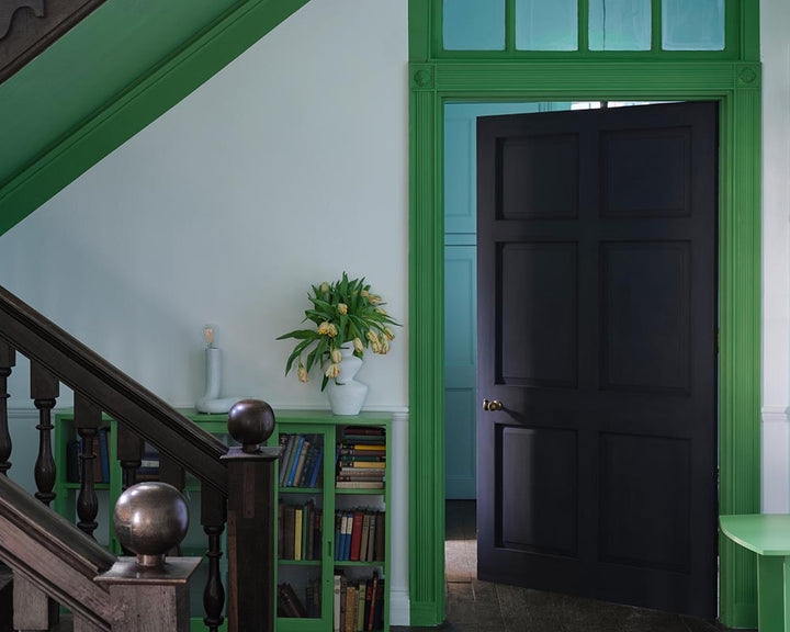 Raw Tomatillo CB6 paint by Farrow & Ball on woodwork in a hallway