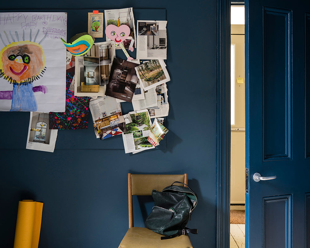 Stiffkey Blue 281 paint by Farrow & Ball used on the walls and woodwork of a childs bedroom