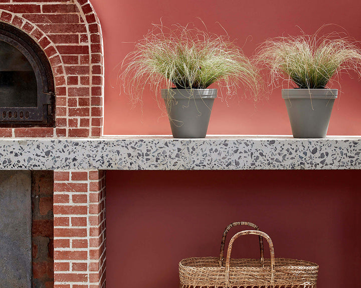 Little Greene Tuscan Red 140 Paint on an exterior wall