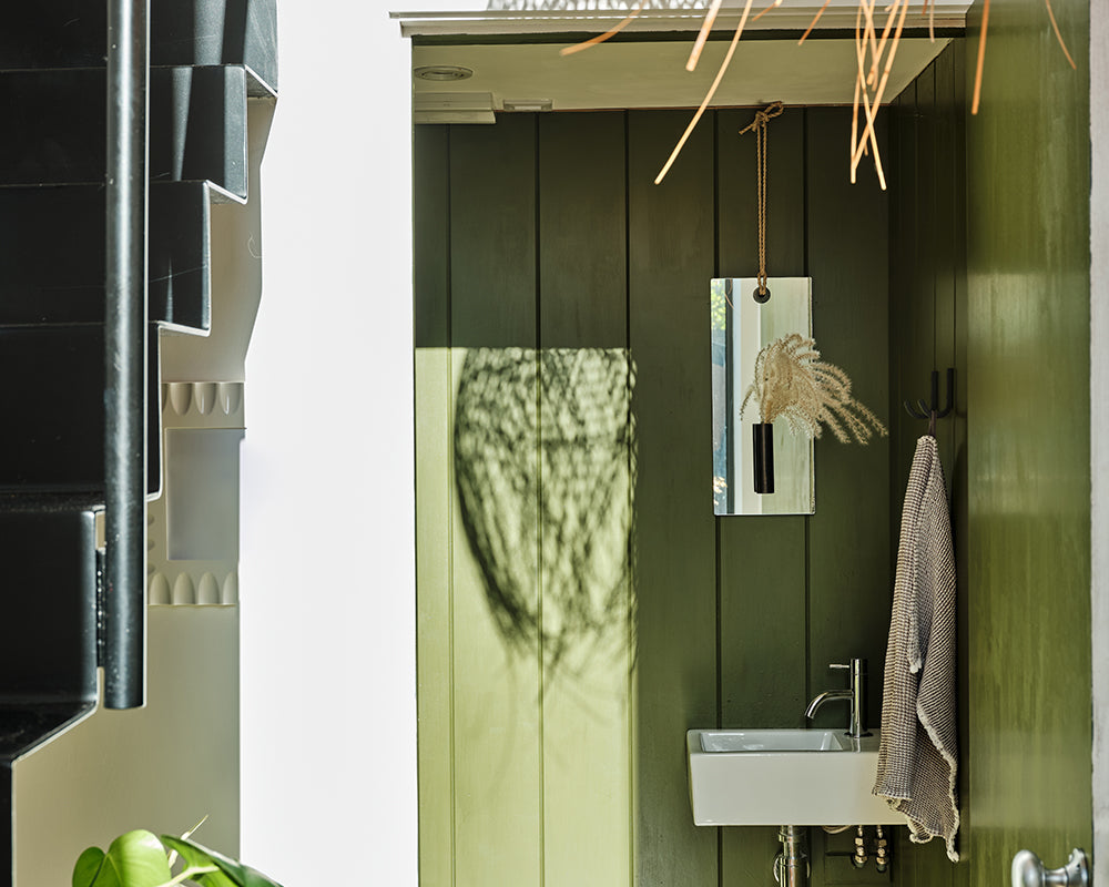 Bancha 298 paint by Farrow & Ball in a cloakroom