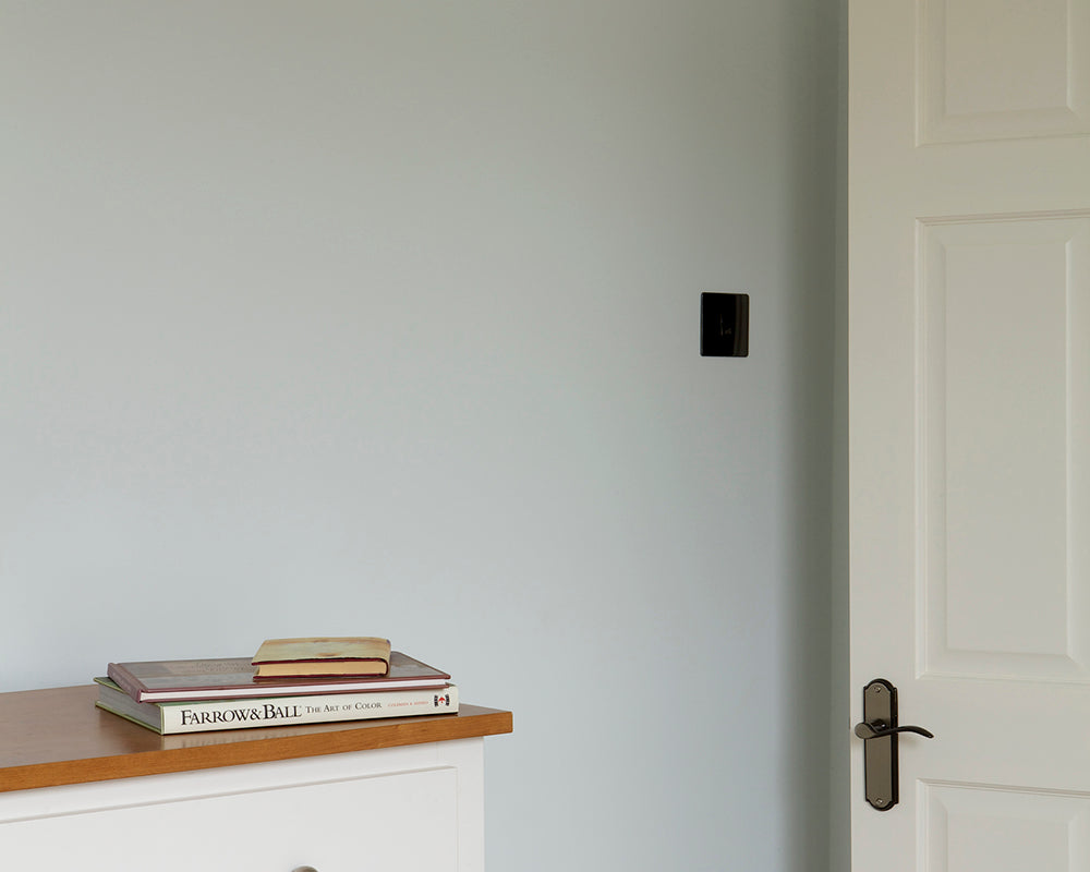 Cabbage White 269 paint by Farrow & Ball used on the walls of a living space