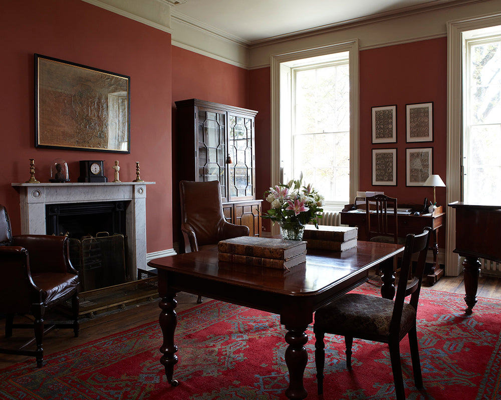 Book Room Red 50 paint by Farrow & Ball in a traditional living room