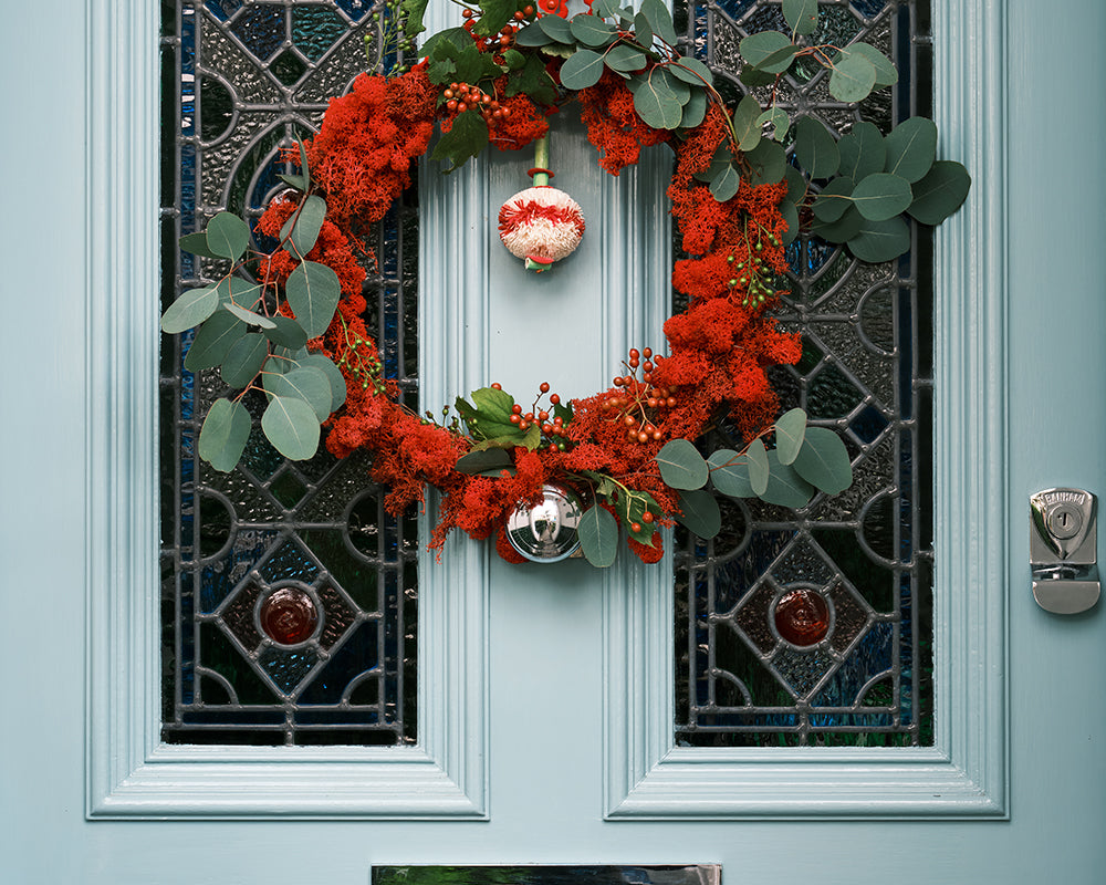 Dix Blue 82 paint by Farrow & Ball used on a traditional front door with beautiful wreath