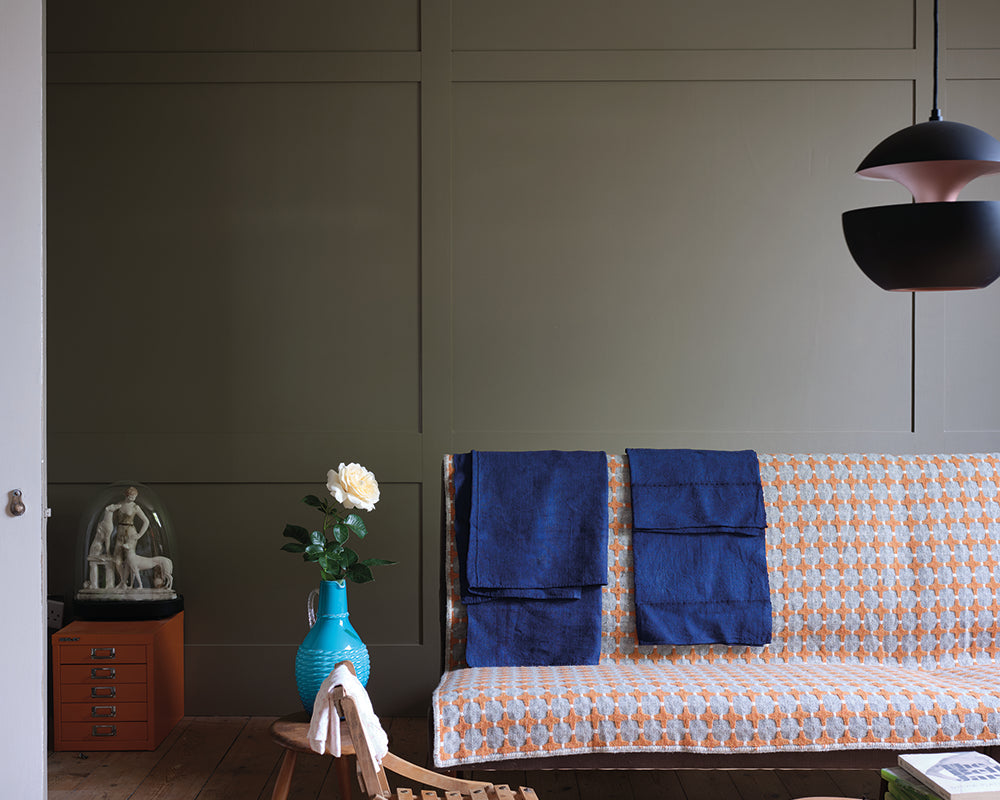 Broccoli Brown W108 paint by Farrow & Ball used on panelling in a living room