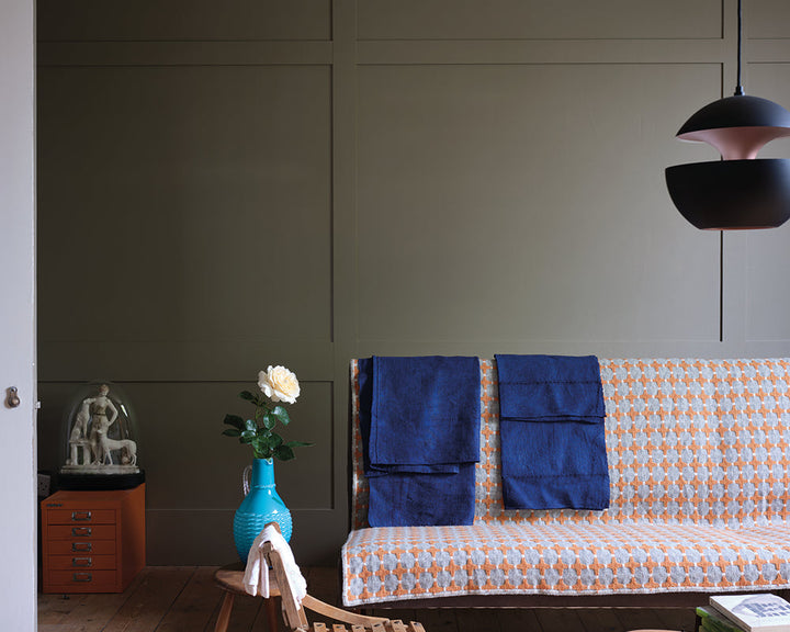 Broccoli Brown W108 paint by Farrow & Ball used on panelling in a living room