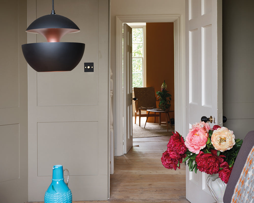 Broccoli Brown W108 paint by Farrow & Ball used on panelling in a living room