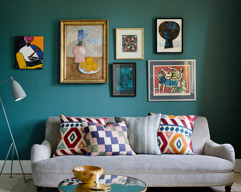 Farrow & Ball Mere Green 219 Paint in a living room with picture gallery