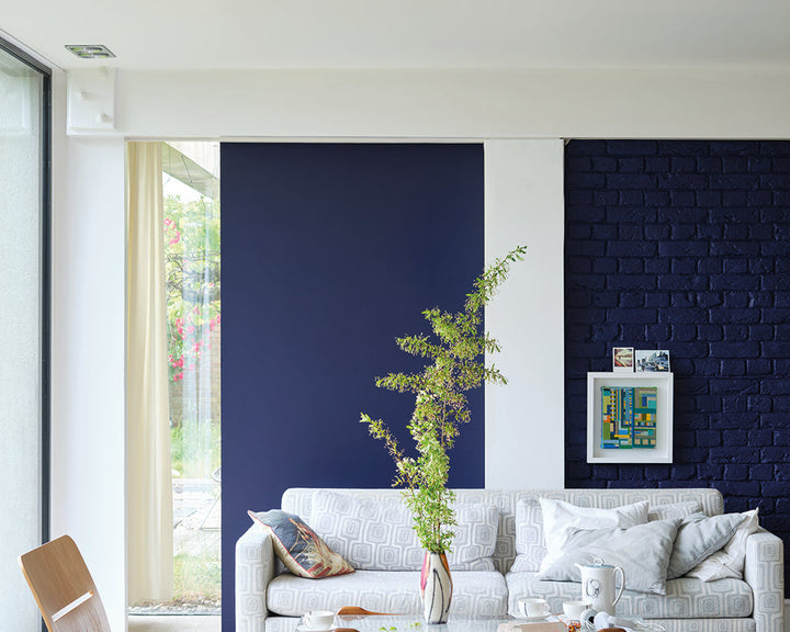 Titmouse Blue W24 paint by Farrow & Ball used in a living room