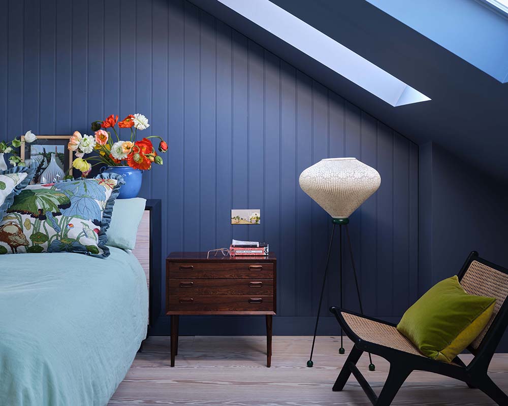 Wine Dark 308 paint by Farrow & Ball used on cladding in a modern bedroom
