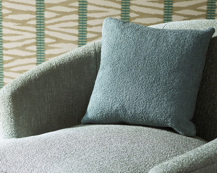 Jane Churchill Wilder Wallpaper ona wall with a seat