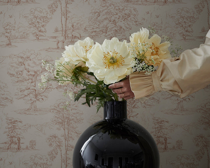 Sandberg Montfort Wallpaper in a room with flowers