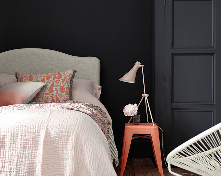 Little Greene Orange Aurora 21 Paint on a stool in a bedroom