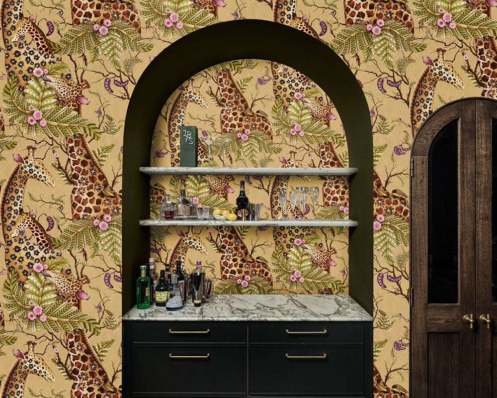 Bar area with giraffe-themed Cole & Son Royal Giraffe Wallpaper and shelves.