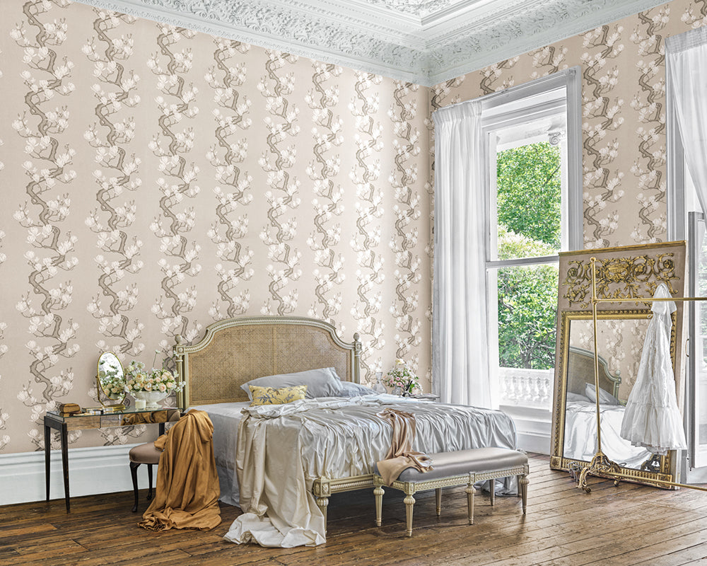 Luxurious bedroom with ornate Magnolia Tree wallpaper from Cole & Son, bed, and decorative elements.