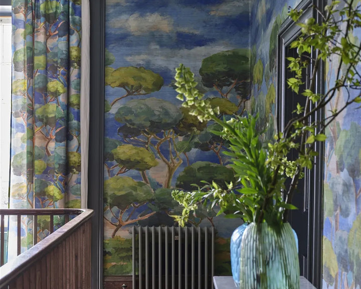 Room interior with Designers Guild Matsu Wallpaper - Grasscloth and a vase with greenery.