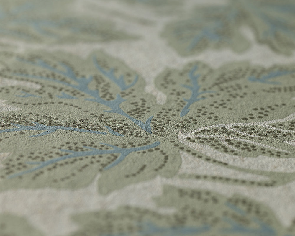 Farrow & Ball vine Leaf - Close-up of a textured wallpaper featuring a muted sage green and light blue botanical pattern on a warm off-white background.