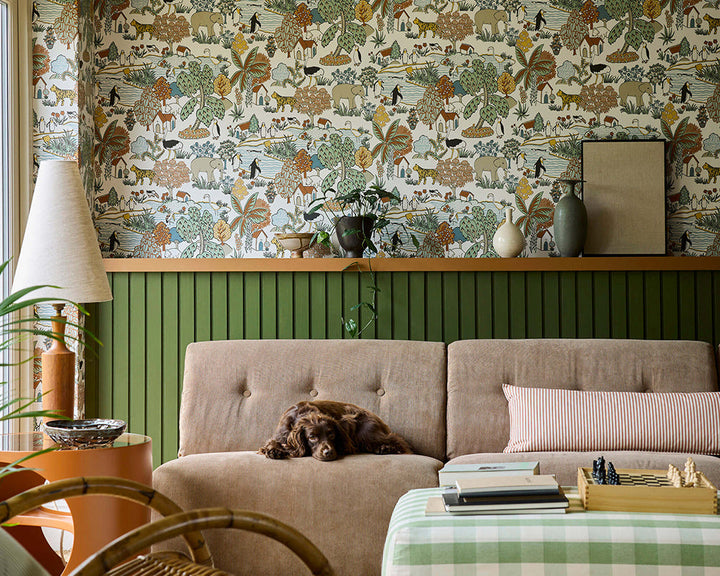 Little Greene Animal Kingdom Wallpaper in Pea in a living room