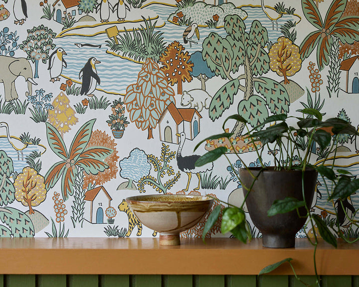 Little Greene Animal Kingdom Wallpaper in Pea in a living room close up