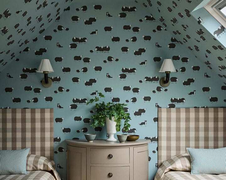 Little Greene Nip & Lassie Wallpaper in Celestial Blue in a bedroom