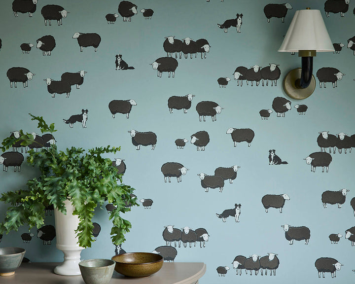 Little Greene Nip & Lassie Wallpaper in Celestial Blue in a bedroom