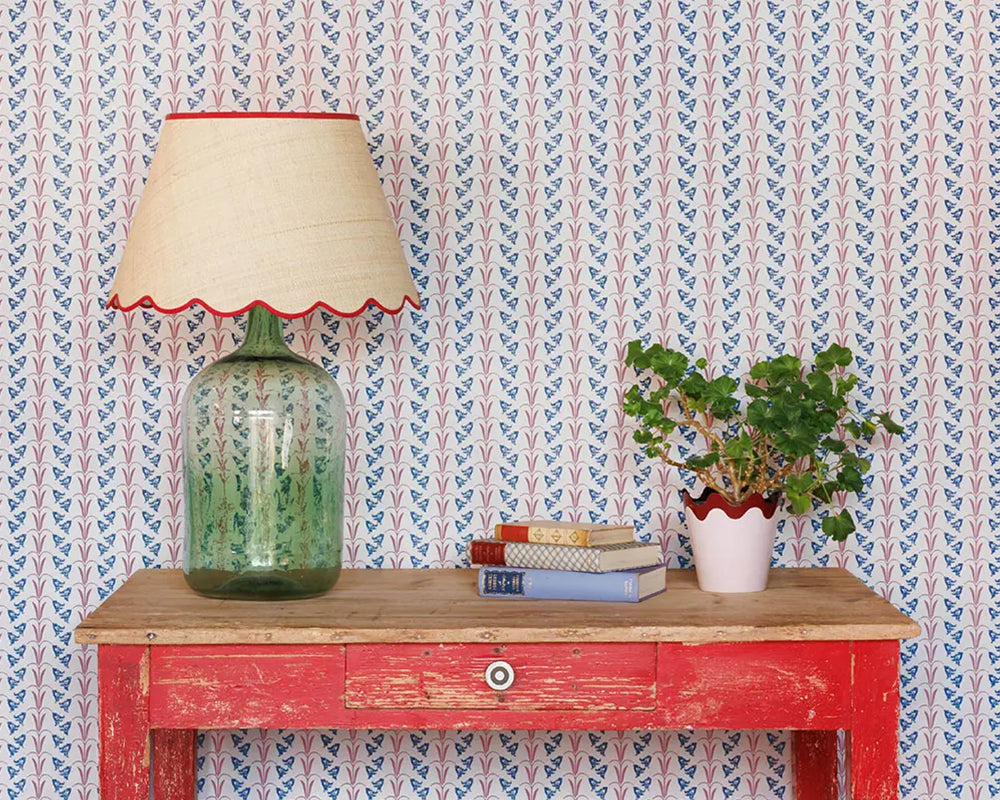 Barneby Gates Bluebells Wallpaper in Blue / Raspberry in a desk set up