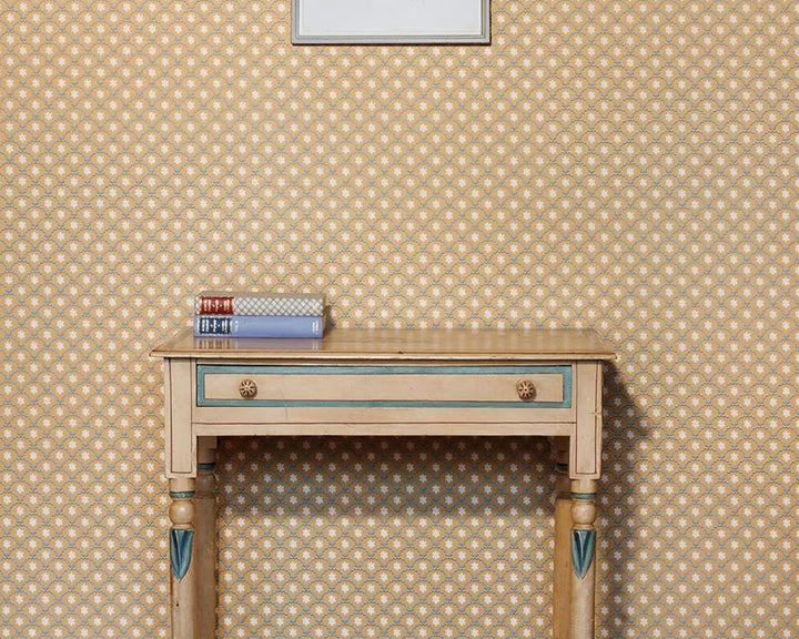 Barneby Gates Daisy Scallops Wallpaper in Sand/Ink with a desk