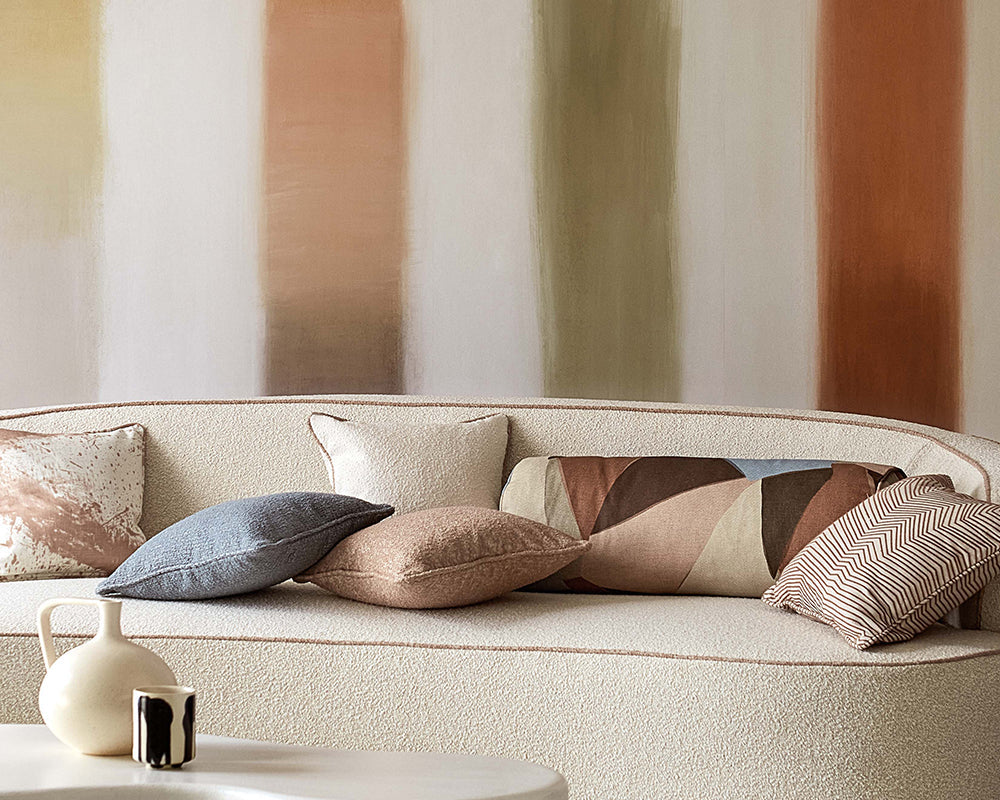 Harlequin Onburu Wallpaper in Rosewood/Seaglass in a living space