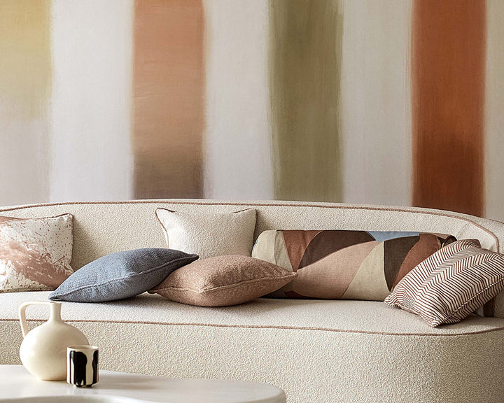 Harlequin Onburu Wallpaper in Rosewood/Seaglass in a living space