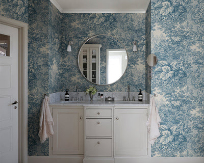 Sandberg Forest Toile Wallpaper in Blue in a bathroom