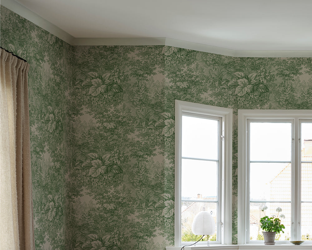 Sandberg Forest Toile Wallpaper in Green in a living room