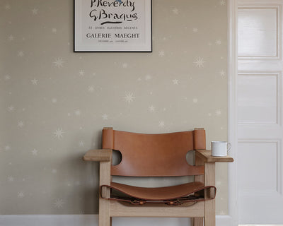 Sandberg Gillis Wallpaper in Sandstone with a chair