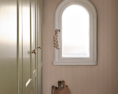 Sandberg Linn Wallpaper in Pink in a pantry