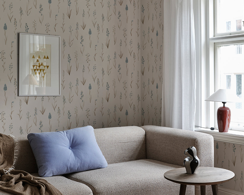 Sandberg Alma Wallpaper in Misty Blue in a living room